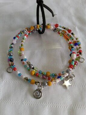 C- Handmade memory wire bracelets set with beads and pendants